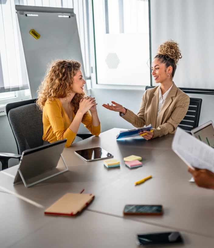 Professionals collaborating at a conference table